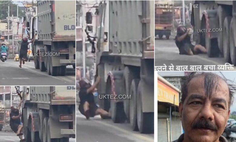 A narrow escape of person being crushed under tyre of truck in Dehradun.