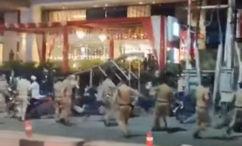 A person taken into police custody for objectionable comment in social media,police dispersed mob gathered.